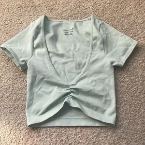Never worn mint green Aeire cropped scruntch top